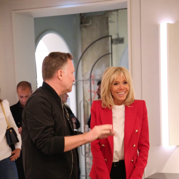 Brigitte Macron - Visite de l'exposition Brut et Précieux, à la Compagnie des Philanthropes à Paris, le jeudi 13 septembre 2018. Ici : Stéphane Parmentier, Brigitte Macron