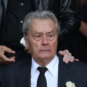 Alain Delon - Sorties des obsèques de Mireille Darc en l'église Saint-Sulpice à Paris. Le 1er septembre 2017