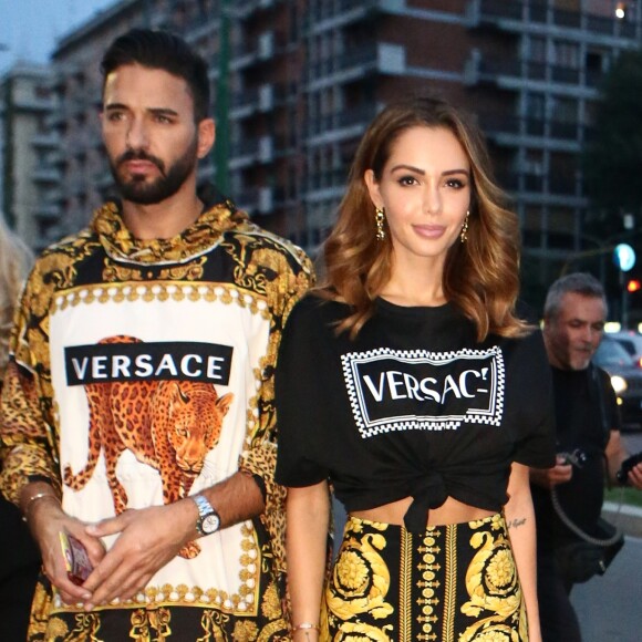 Nabilla Benattia et Thomas Vergara au défilé Versace - Collection Prêt-à-Porter Printemps/Eté 2019" lors de la Fashion Week de Milan (MLFW) le 21 septembre 2018.