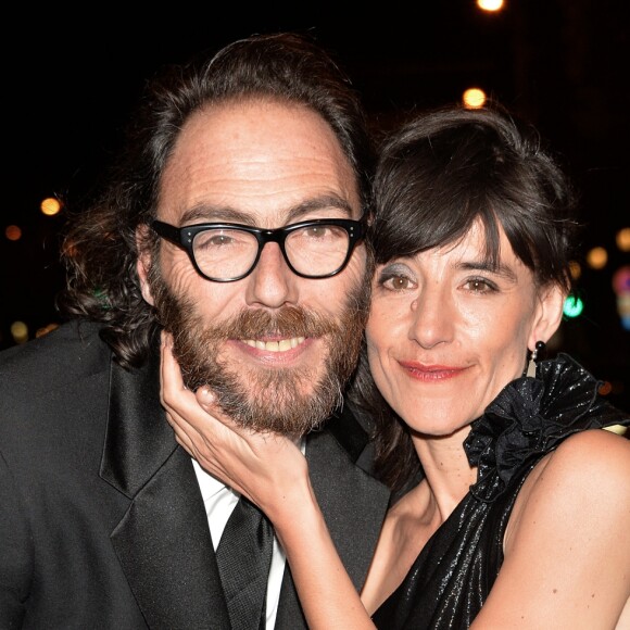 Romane Bohringer et Philippe Rebbot - Personnalités lors de la 10ème cérémonie des Globes de Cristal au Lido à Paris, le 13 avril 2015.