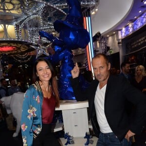 Exclusif - Delphine Wespiser (Miss France 2012) et son compagnon Roger Erhart - Premier anniversaire de la collaboration entre le sculpteur Richard Orlinski et Disneyland Paris, au Disney Store, à Paris, le 4 octobre 2018. © Rachid Bellak/Bestimage