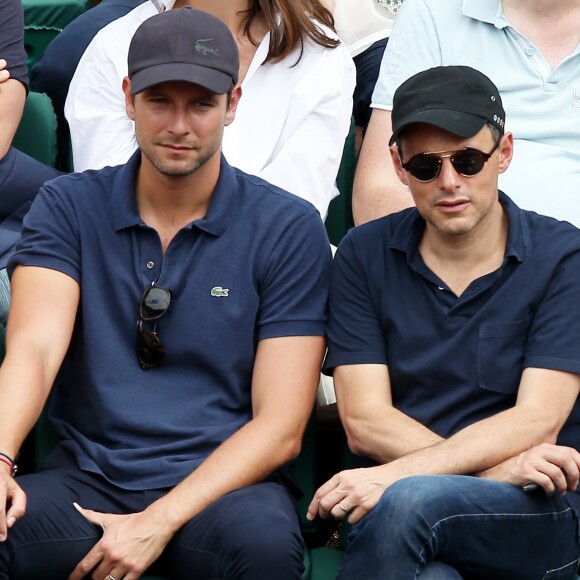 Marc-Olivier Fogiel et mari François Roelants dans les tribunes lors de la finale homme des Internationaux de Tennis de Roland-Garros à Paris le 11 juin 2017. © Dominique Jacovides-Cyril Moreau/Bestimage