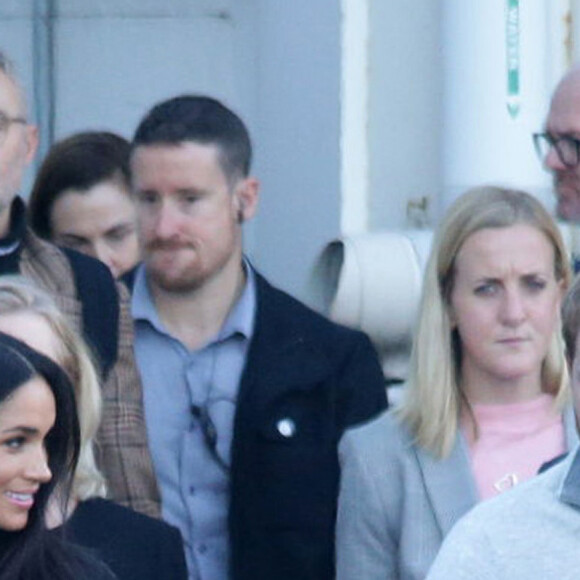 Le prince Harry, duc de Sussex, et Meghan Markle, duchesse de Sussex (enceinte) arrivent à l'aéroport de Sydney dans le cadre de leur tournée dans le Pacifique, le 15 octobre 2018, avant le début des Invictus Games.