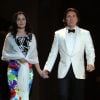 Exclusif - Roberto Alagna et sa compagne la soprano polonaise Aleksandra Kurzak main dans la main lors du concert d'été Summer Dream au profit de la Fondation du prince Albert II de Monaco en faveur de l'environnement, le 9 août 2014 en principauté, dans la cour du palais princier.