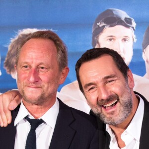 Benoît Poelvoorde et Gilles Lellouche lors de l'avant première du film "Le Grand Bain" au cinéma UGC De Brouckère, à Bruxelles, Belgique, le 10 octobre 2018.