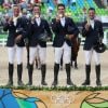 Karim Laghouag, Mathieu Lemoine, Astier Nicolas et Thibaut Vallette sur la plus haute marche du podium le 9 août 2016 aux Jeux olympiques de Rio de Janeiro, médaillés d'or du concours complet par équipe.