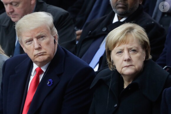 Le président des Etats-Unis Donald Trump, la chancelière allemande Angela Merkel - Cérémonie internationale du centenaire de l'armistice du 11 novembre 1918 à l'Arc de Triomphe à Paris le 11 novembre 2018.