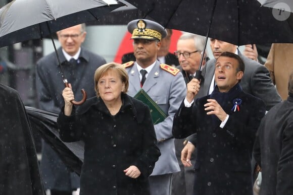 Angela Merkel et Emmanuel Macron - Cérémonie internationale du centenaire de l'Armistice du 11 novembre 1918 à l'Arc de Triomphe à Paris © Cyril Moreau / Bestimage