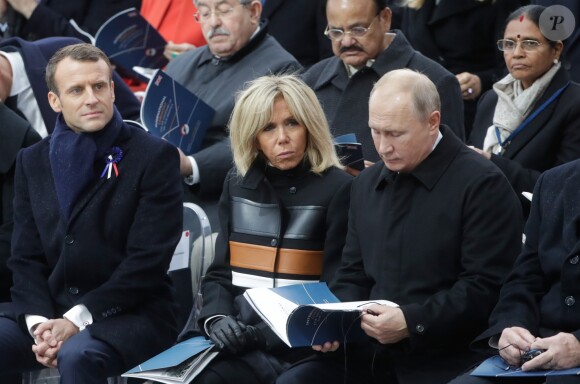 Le président Emmanuel Macron, la première dame Brigitte Macron, le président de la Russie Vladimir Poutine - Cérémonie internationale du centenaire de l'armistice du 11 novembre 1918 à l'Arc de Triomphe à Paris le 11 novembre 2018.