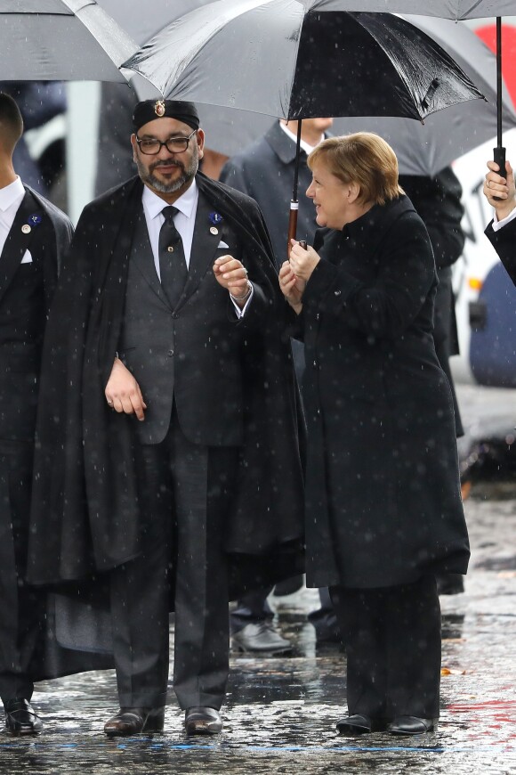Le roi Mohammed VI du Maroc et Angela Merkel - Cérémonie internationale du centenaire de l'Armistice du 11 novembre 1918 à l'Arc de Triomphe à Paris © Cyril Moreau / Bestimage