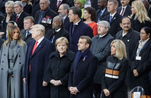 Le président Donald Trump, sa femme Melania, la chancelière allemande Angela Merkel, le président Emmanuel Macron, la première dame Brigitte Macron - Cérémonie internationale du centenaire de l'armistice du 11 novembre 1918 à l'Arc de Triomphe à Paris le 11 novembre 2018.