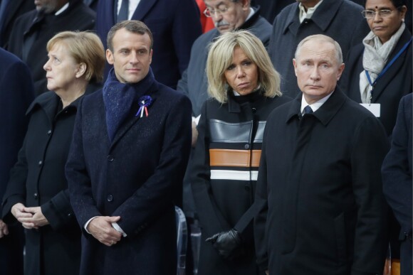 La chancelière allemande Angela Merkel, le président Emmanuel Macron, la première dame Brigitte Macron, le président de la Russie Vladimir Poutine - Cérémonie internationale du centenaire de l'armistice du 11 novembre 1918 à l'Arc de Triomphe à Paris le 11 novembre 2018.