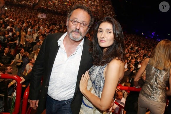Exclusif - Jean Reno et sa femme Zofia - People au concert de Johnny Hallyday au POPB de Bercy à Paris - Jour 2. Le 15 juin 2013