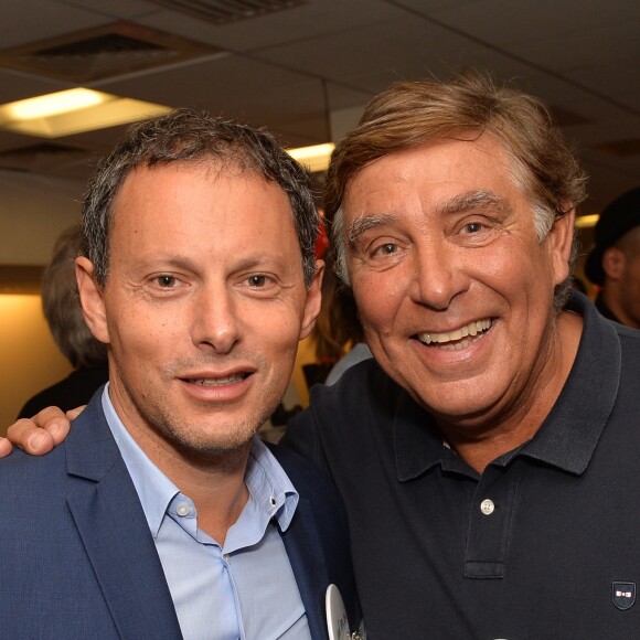 Marc-Olivier Fogiel et Jean-Pierre Foucault lors de la 13ème édition du Charity Day dans la salle des marchés d'Aurel BGC dans le quartier de la Bourse à Paris le 11 septembre 2017. © Veeren / Bestimage