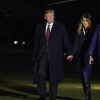 Donald Trump avec sa femme Melania et leur fils Barron arrivent à la Maison Blanche après avoir passé le week-end à Palm Beach le 25 novembre 2018.