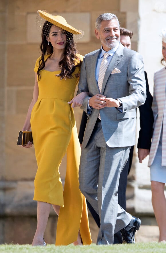 George Clooney et sa femme Amal Alamuddin Clooney - Les invités à la sortie de la chapelle St. George au château de Windsor, Royaume Uni, le 19 mai 2018.