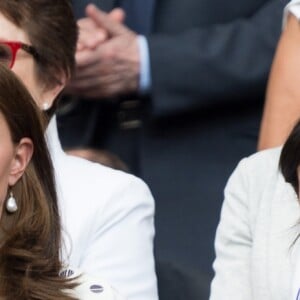 Kate Middleton, duchesse de Cambridge, et Meghan Markle, duchesse de Sussex, à Wimbledon le 14 juillet 2018.