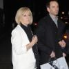 La mère et le frère de Victoria Beckham, Jackie et Christian, quittent la soirée H&M à Londres le 1er février 2012.