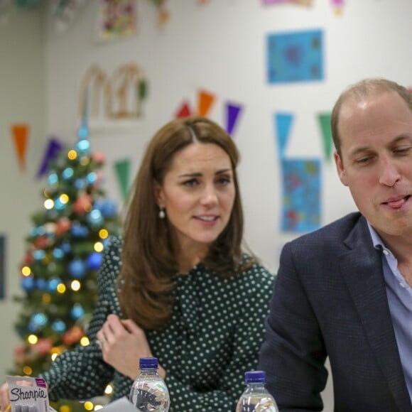 Kate Middleton, duchesse de Cambridge, et le prince William, duc de Cambridge, en visite au Centre d'aide aux sans-abri "The Passage" à Londres, le 11 décembre 2018. William est très attaché à ce lieu qu'il a découvert enfant lors d'une visite avec sa mère, Lady Di, en 1994.