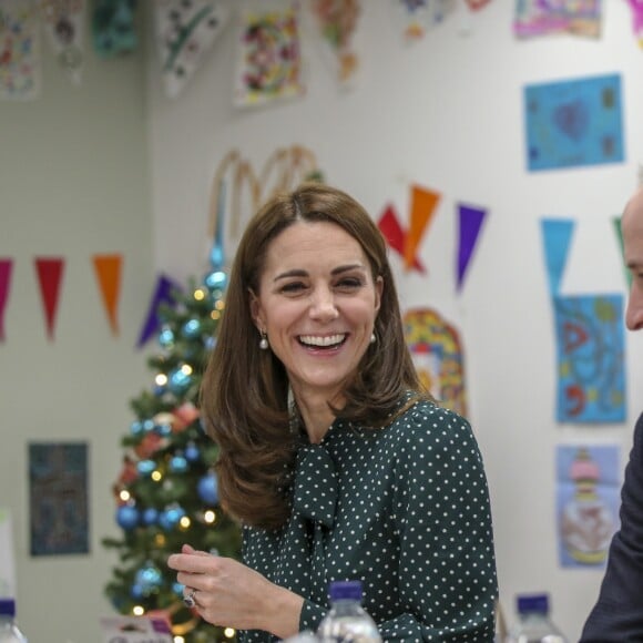 Kate Middleton, duchesse de Cambridge, et le prince William, duc de Cambridge, en visite au Centre d'aide aux sans-abri "The Passage" à Londres, le 11 décembre 2018. William est très attaché à ce lieu qu'il a découvert enfant lors d'une visite avec sa mère, Lady Di, en 1994.