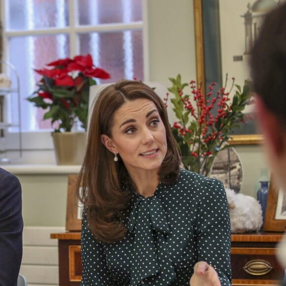 Kate Middleton, duchesse de Cambridge, et le prince William, duc de Cambridge, en visite au Centre d'aide aux sans-abri "The Passage" à Londres, le 11 décembre 2018. William est très attaché à ce lieu qu'il a découvert enfant lors d'une visite avec sa mère, Lady Di, en 1994.