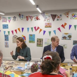 Kate Middleton, duchesse de Cambridge, et le prince William, duc de Cambridge, en visite au Centre d'aide aux sans-abri "The Passage" à Londres, le 11 décembre 2018. William est très attaché à ce lieu qu'il a découvert enfant lors d'une visite avec sa mère, Lady Di, en 1994.