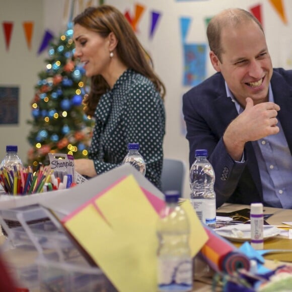 Kate Middleton, duchesse de Cambridge, et le prince William, duc de Cambridge, en visite au Centre d'aide aux sans-abri "The Passage" à Londres, le 11 décembre 2018. William est très attaché à ce lieu qu'il a découvert enfant lors d'une visite avec sa mère, Lady Di, en 1994.