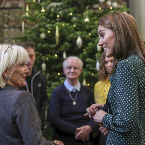 Kate Middleton, duchesse de Cambridge, et le prince William, duc de Cambridge, en visite au Centre d'aide aux sans-abri "The Passage" à Londres, le 11 décembre 2018. William est très attaché à ce lieu qu'il a découvert enfant lors d'une visite avec sa mère, Lady Di, en 1994.