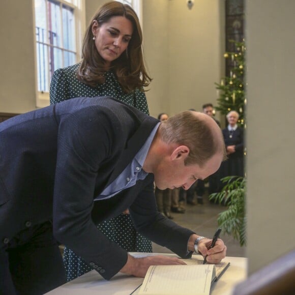 Kate Middleton, duchesse de Cambridge, et le prince William, duc de Cambridge, en visite au Centre d'aide aux sans-abri "The Passage" à Londres, le 11 décembre 2018. William est très attaché à ce lieu qu'il a découvert enfant lors d'une visite avec sa mère, Lady Di, en 1994.