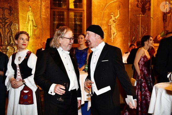 James P Allison, David Howell Evans ("The Edge" du groupe U2) lors de la soirée dansante au dîner des lauréats du prix Nobel au palais royal à Stockholm en Suède le 11 décembre 2018.