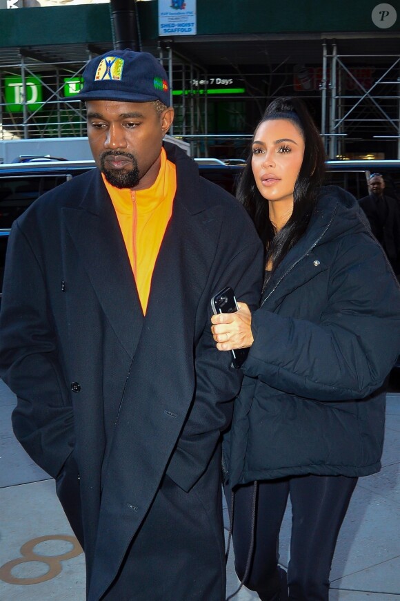 Kim Kardashian et son mari Kanye West à la sortie de leur hôtel à New York, le 3 décembre 2018