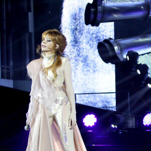 Mylène Farmer sur la scène de Bercy, à Paris, pour la première date de la tournée Timeless 2013, le 7 septembre 2013.