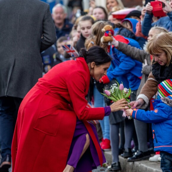 Le prince Harry et Meghan Markle lors d'une visite à Birkenhead le 14 janvier 2019.