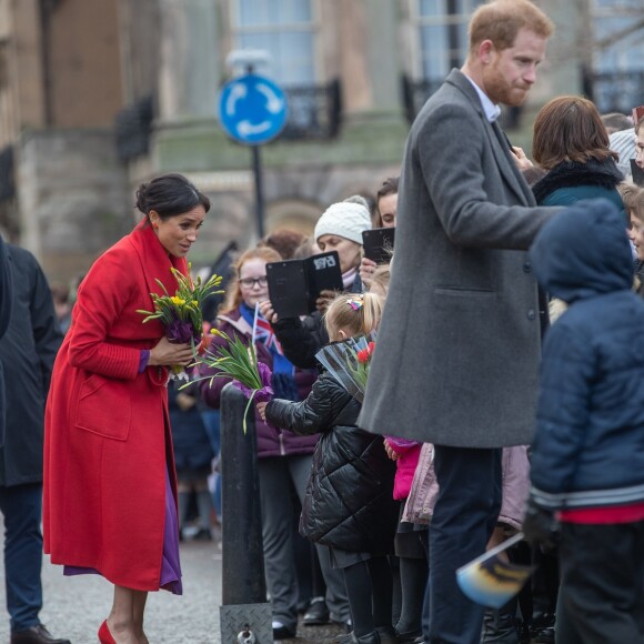 Le prince Harry et Meghan Markle lors d'une visite à Birkenhead le 14 janvier 2019.