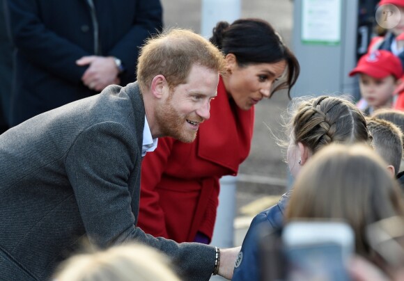 Le prince Harry, duc de Sussex, et Meghan Markle, duchesse de sussex, enceinte, lors d'une visite à Birkenhead le 14 janvier 2019.