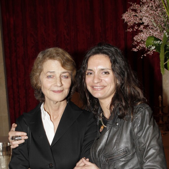 Charlotte Rampling et Emilie Jarre au palais de l'Elysée le 14 mars 1012. 