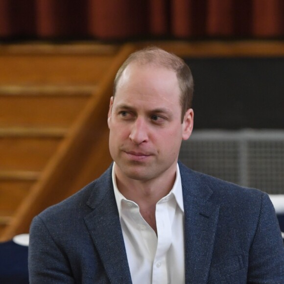 Le prince William, duc de Cambridge, rencontre des jeunes pères lors d'une réunion de groupe pour les aider dans leurs futures responsabilités au centre Abbey de Westminster le 14 février 2019.