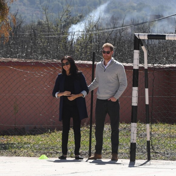 Le prince Harry, duc de Sussex, et Meghan Markle, duchesse de Sussex, enceinte, visitent le "Lycée Qualifiant Grand Atlas" dans le cadre de leur voyage officiel au Maroc, le 24 février 2019.  The Duke and Duchess visit the local Secondary School meeting students and teachers. Morocco, February 24th, 2019.24/02/2019 - Asni