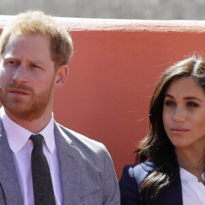 Le prince Harry, duc de Sussex, et Meghan Markle, duchesse de Sussex, enceinte, visitent le "Lycée Qualifiant Grand Atlas" dans le cadre de leur voyage officiel au Maroc, le 24 février 2019.