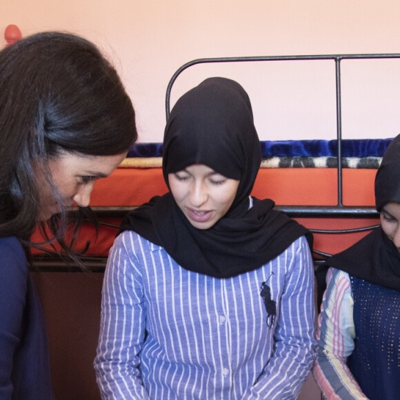 Le prince Harry, duc de Sussex, et Meghan Markle, duchesse de Sussex, enceinte, visitent un pensionnat de jeunes filles à Asni dans le cadre de leur voyage officiel au Maroc, le 24 février 2019.  Britain's Prince Harry and Meghan, Duchess of Sussex visit a girls boarding school in the village of Asni in the Atlas Mountains of Morocco. February 24th, 2019.24/02/2019 - Asni