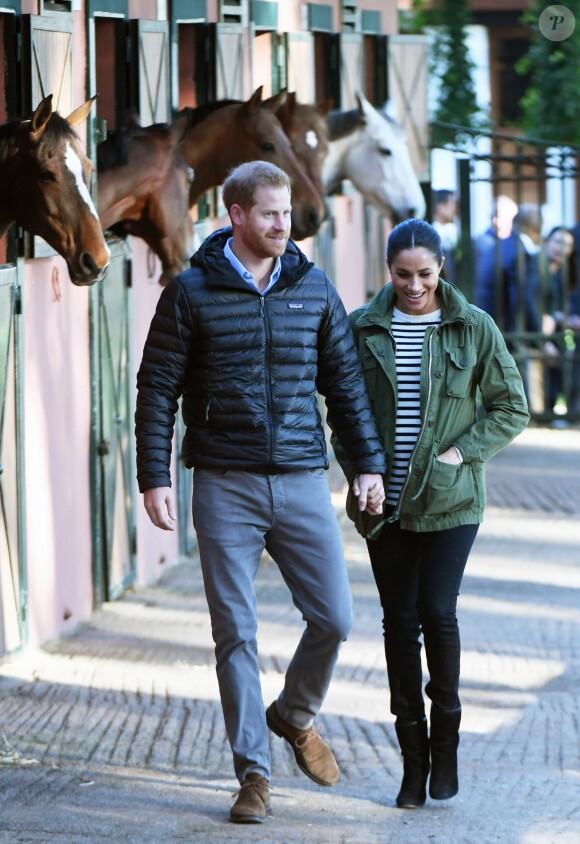 Le prince Harry, duc de Sussex et Meghan Markle (enceinte), duchesse de Sussex en visite à la Fédération Royale Marocaine de Sports Equestres à Rabat, lors de leur voyage officiel au Maroc. Le 25 février 2019