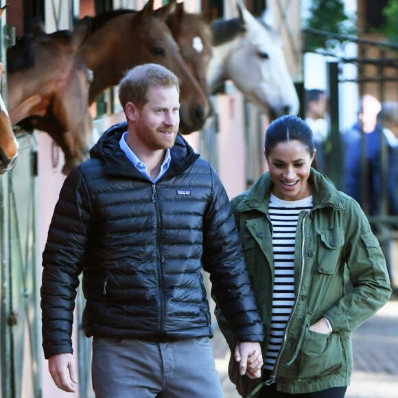 Le prince Harry, duc de Sussex et Meghan Markle (enceinte), duchesse de Sussex en visite à la Fédération Royale Marocaine de Sports Equestres à Rabat, lors de leur voyage officiel au Maroc. Le 25 février 2019