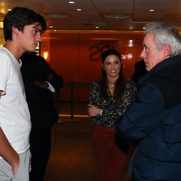 Exclusif - Alain-Fabien Delon reçoit la visite de son oncle Jean-François Delon en présence de sa compagne Capucine Anav lors de la dédicace de son roman "De la race des seigneurs" aux éditions Stock à la FNAC des Ternes à Paris le 14 février 2019. © Sébastien Valiela/Bestimage