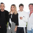 Robbie Williams et sa femme Ayda, Louis Tomlinson et Simon Cowell sont les nouveaux juges de l'émission "The X Factor" à Londres, le 17 juillet 2018.