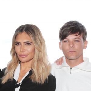 Robbie Williams et sa femme Ayda, Louis Tomlinson et Simon Cowell sont les nouveaux juges de l'émission "The X Factor" à Londres, le 17 juillet 2018.