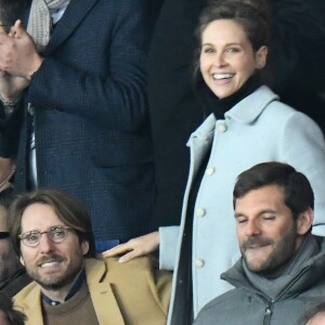 Ophelie Meunier et son mari Mathieu Vergne dans les tribunes du parc des Princes lors du match de football de ligue 1, opposant le Paris Saint-Germain (PSG) contre l'Olympique de Marseille (OM) à Paris, France, le 17 mars 2019. Le PSG a gagné 3-1.