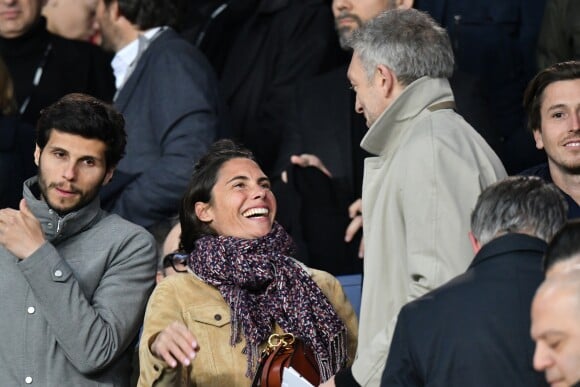 Alessandra Sublet et Vincent Cassel dans les tribunes du parc des Princes lors du match de football de ligue 1, opposant le Paris Saint-Germain (PSG) contre l'Olympique de Marseille (OM) à Paris, France, le 17 mars 2019. Le PSG a gagné 3-1.