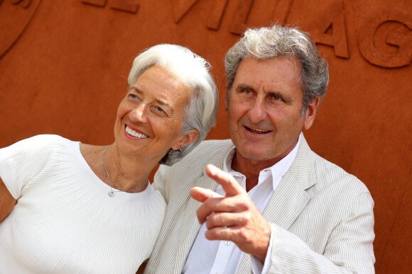 Christine Lagarde et son compagnon Xavier Giocanti - People dans le village lors de la finale du tournoi de tennis de Roland-Garros à Paris, le 7 juin 2015.