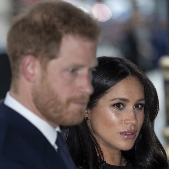 Le prince Harry, duc de Sussex, Meghan Markle, duchesse de Sussex lors de la signature du livre des condoléances à New Zealand House à Londres en hommage aux victimes de la tuerie de Christchurch, le 19 mars 2019.