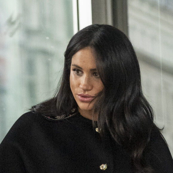 Meghan Markle, duchesse de Sussex lors de la signature du livre des condoléances à New Zealand House à Londres en hommage aux victimes de la tuerie de Christchurch. Londres, le 19 mars 2019.